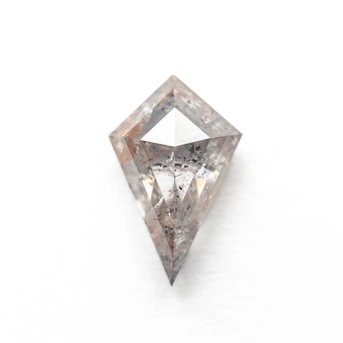 1.24 Carat Icy White Black And Orange Speckled Rose Cut Kite Diamond